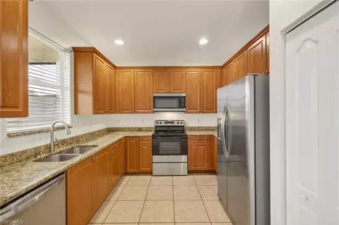 Kitchen - 7029 Ambrosia Ln #606, Naples, FL 34119 photo 1 of 3