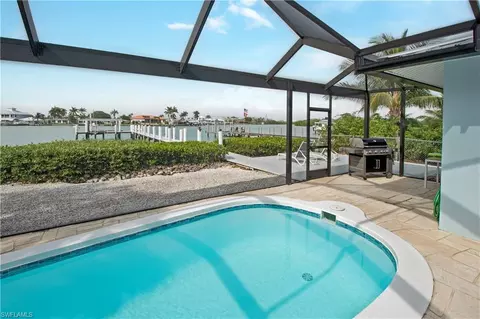 Exterior - 19 Pelican St E, Naples, FL 34113 photo 8 of 14