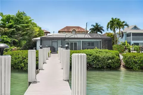 Exterior - 19 Pelican St E, Naples, FL 34113 photo 13 of 14
