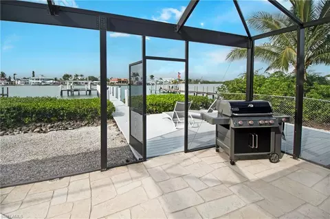 Exterior - 19 Pelican St E, Naples, FL 34113 photo 10 of 14