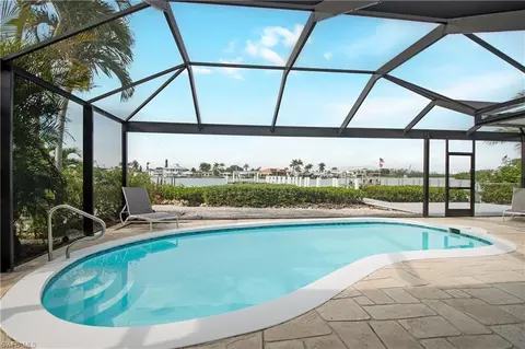 Exterior - 19 Pelican St E, Naples, FL 34113 photo 7 of 14