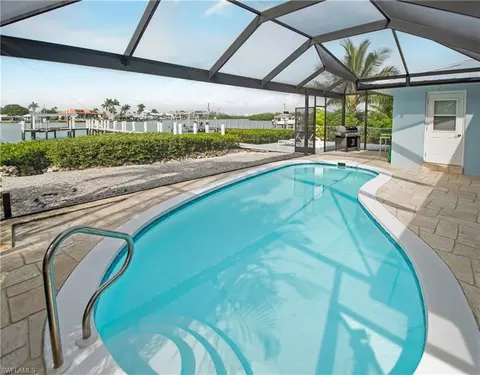 Exterior - 19 Pelican St E, Naples, FL 34113 photo 9 of 14