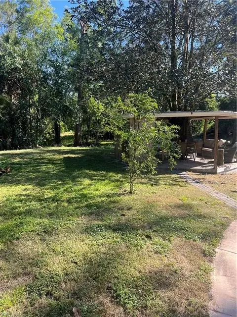 Exterior - 3311 25th Ave SW, Naples, FL 34117 photo 4 of 9