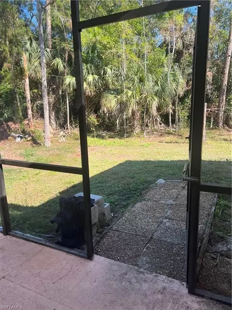 Exterior - 3311 25th Ave SW, Naples, FL 34117 photo 6 of 9