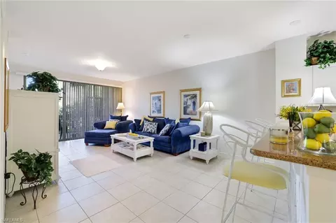 Living - 10049 Heather Ln #101, Naples, FL 34119 photo 1 of 4