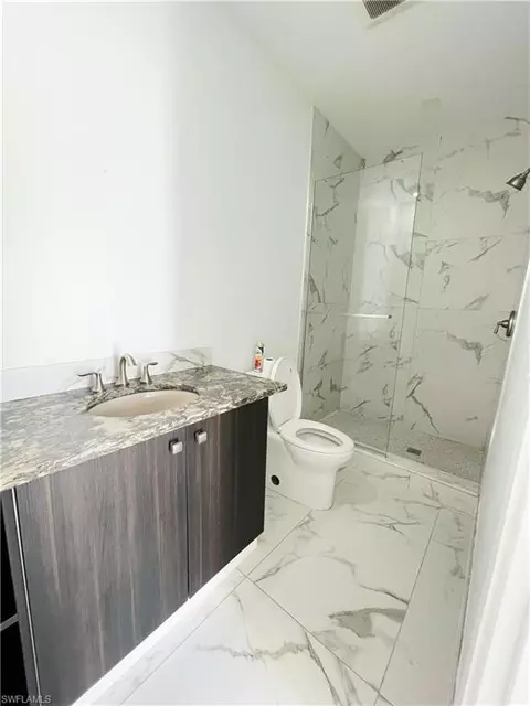 Bath - 5321 Warren St, Naples, FL 34113 photo 5 of 5