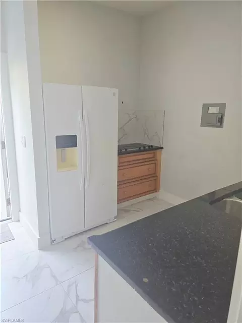 Kitchen - 5321 Warren St, Naples, FL 34113 photo 3 of 3