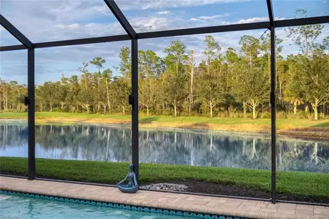 7457 Winding Cypress Dr, Naples, FL 34114