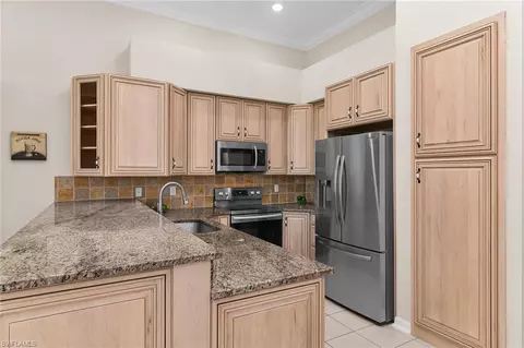 Kitchen - 8574 Pepper Tree Way, Naples, FL 34114 photo 4 of 4