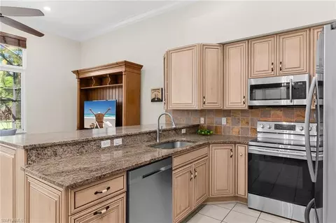 Kitchen - 8574 Pepper Tree Way, Naples, FL 34114 photo 2 of 4