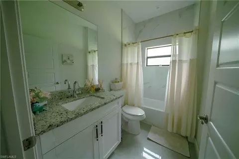 Bath - 4264 8th Ave NE, Naples, FL 34120 photo 2 of 2