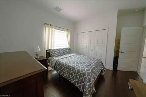 Bedroom - 4264 8th Ave NE, Naples, FL 34120 photo 2 of 3