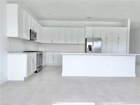 Kitchen - 20885 Thistle Leaf Ln, Estero, FL 33928 photo 2 of 4