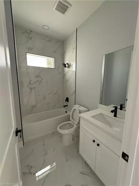 Bath - 1104 Garibaldi St E, Lehigh Acres, FL 33974 photo 3 of 3