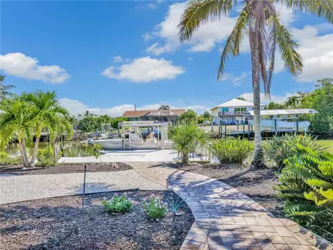 Exterior - 405 Grenada Ave, Naples, FL 34113 photo 6 of 9
