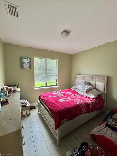 Bedroom - 3232 4th Ave SE, Naples, FL 34117 photo 2 of 3