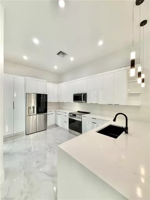 Kitchen - 2135 Della Dr, Naples, FL 34117 photo 3 of 3