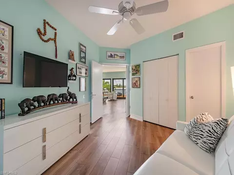 Bedroom - 421 La Peninsula Blvd #421, Naples, FL 34113 photo 2 of 2