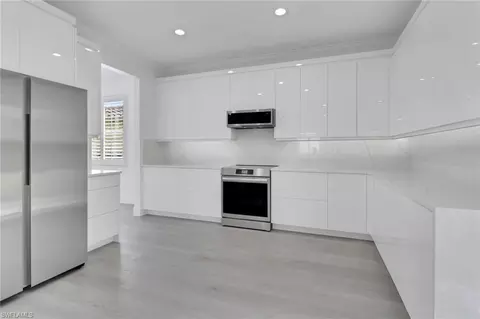 Kitchen - 20522 Ardore Ln, Estero, FL 33928 photo 2 of 3