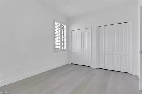 Bedroom - 20522 Ardore Ln, Estero, FL 33928 photo 1 of 5