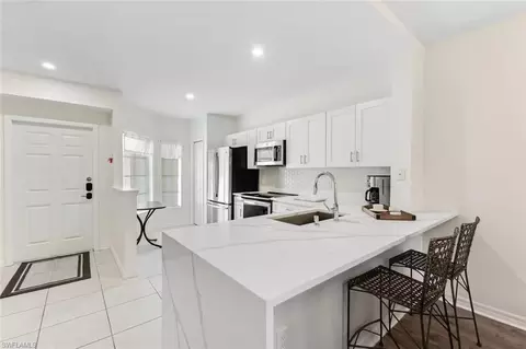 Kitchen - 9185 Celeste Dr #204, Naples, FL 34113 photo 3 of 3