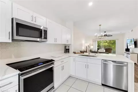 Kitchen - 9185 Celeste Dr #204, Naples, FL 34113 photo 2 of 3