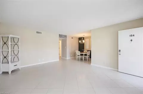 Living - 261 Banyan Blvd #104, Naples, FL 34102 photo 2 of 3