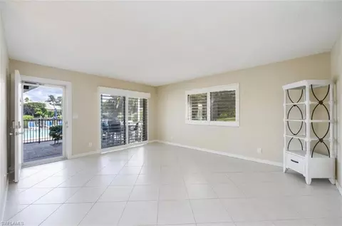 Living - 261 Banyan Blvd #104, Naples, FL 34102 photo 1 of 3