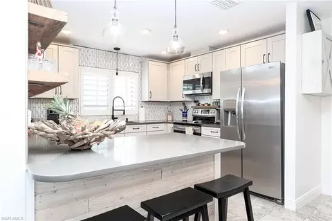 Kitchen - 686 95th Ave N, Naples, FL 34108 photo 1 of 4