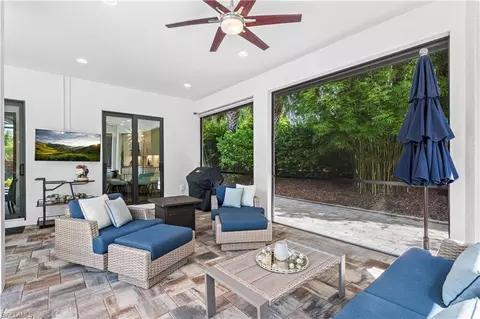 Exterior - 8696 Dilillo Ct, Naples, FL 34119 photo 4 of 13