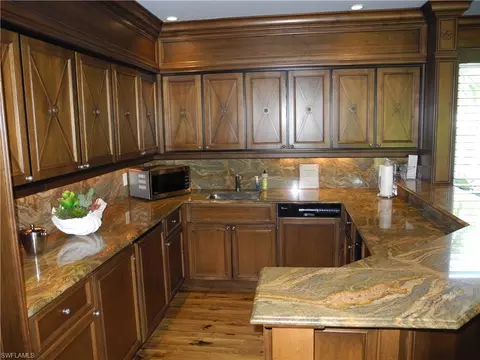 Kitchen - 445 Cove Tower Dr #1702, Naples, FL 34110 photo 5 of 6