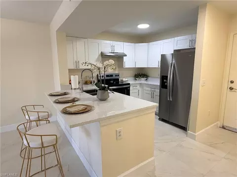 Kitchen - 8274 Key Royal Cir #1012, Naples, FL 34119 photo 5 of 5