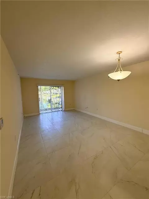 Living - 8274 Key Royal Cir #1012, Naples, FL 34119 photo 2 of 2