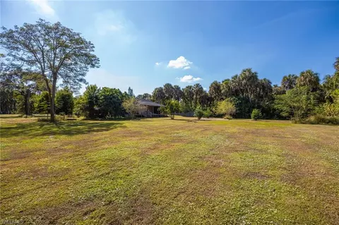 Exterior - 1240 Mingo Dr, Naples, FL 34120 photo 6 of 14