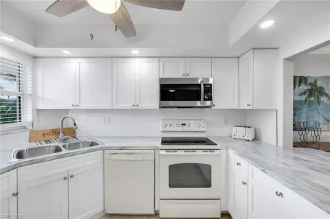 Kitchen - 37 High Point Cir E #109, Naples, FL 34103 photo 3 of 4