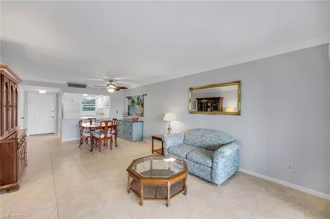 Living - 37 High Point Cir E #109, Naples, FL 34103 photo 1 of 2