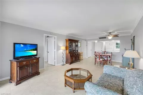 Living - 37 High Point Cir E #109, Naples, FL 34103 photo 2 of 2