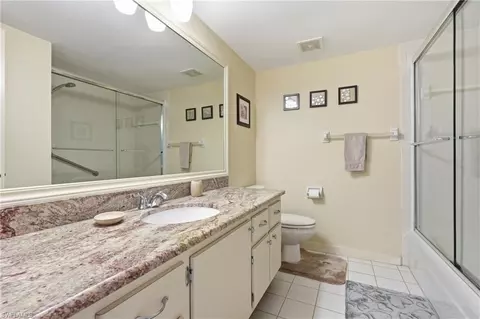 Bath - 215 Cypress Way E #D8, Naples, FL 34110 photo 2 of 2