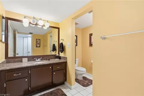 Bath - 215 Cypress Way E #D8, Naples, FL 34110 photo 1 of 2