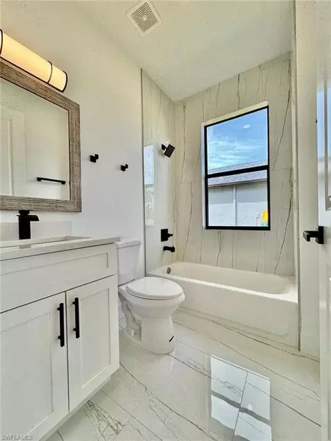 Bath - 3434 27th Ave NE, Naples, FL 34120 photo 4 of 6