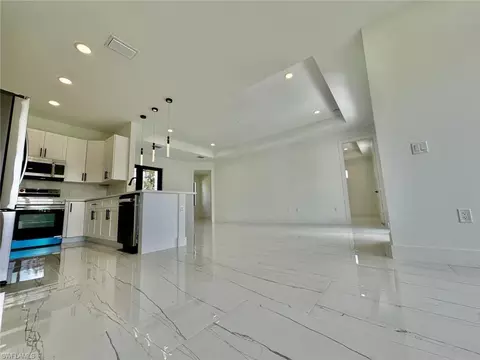 Living - 3434 27th Ave NE, Naples, FL 34120 photo 3 of 13