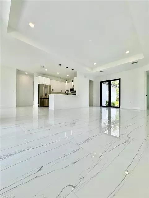 Living - 3434 27th Ave NE, Naples, FL 34120 photo 1 of 13