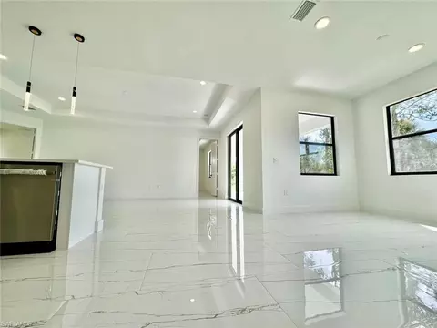 Living - 3434 27th Ave NE, Naples, FL 34120 photo 7 of 13
