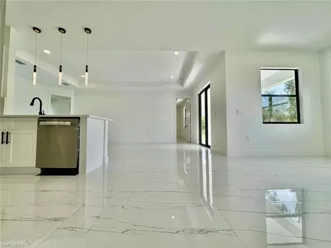 Living - 3434 27th Ave NE, Naples, FL 34120 photo 2 of 13