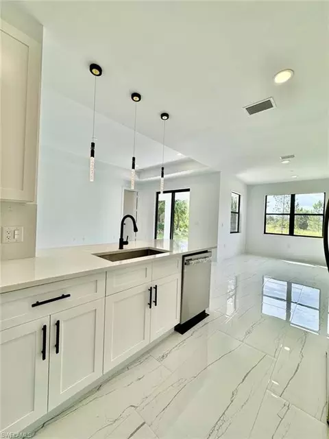 Kitchen - 3434 27th Ave NE, Naples, FL 34120 photo 3 of 7