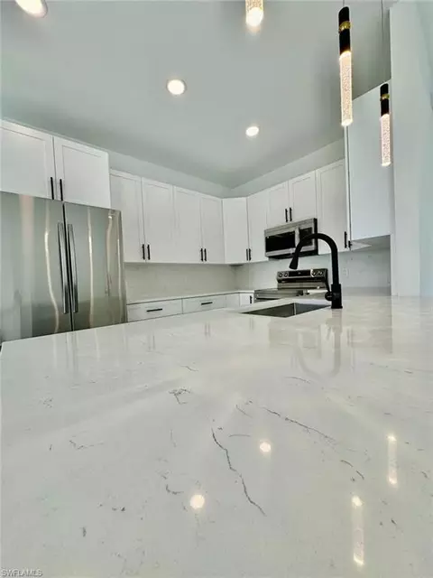 Kitchen - 3434 27th Ave NE, Naples, FL 34120 photo 5 of 7