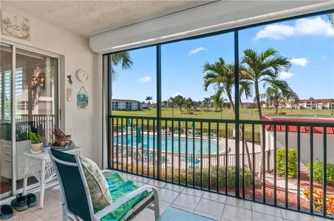 Exterior - 37 High Point Cir E #210, Naples, FL 34103 photo 1 of 7