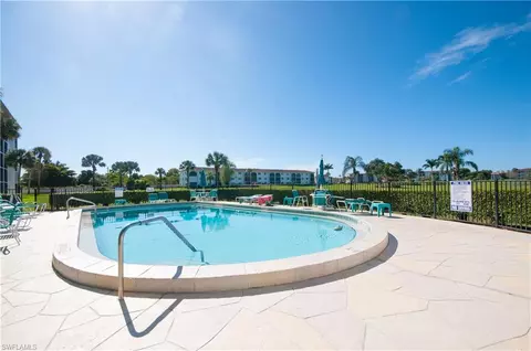 Exterior - 37 High Point Cir E #210, Naples, FL 34103 photo 5 of 7