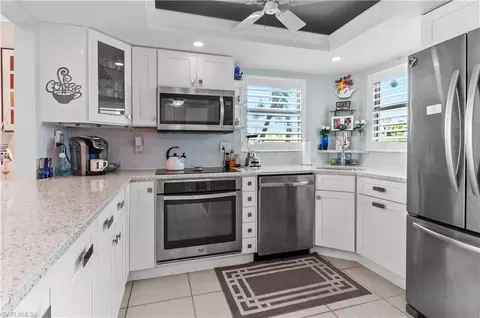 Kitchen - 37 High Point Cir E #210, Naples, FL 34103 photo 3 of 4