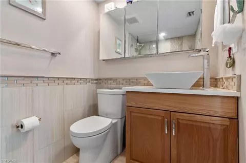 Bath - 37 High Point Cir E #210, Naples, FL 34103 photo 2 of 4